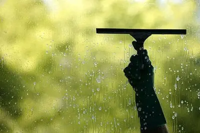 squeegee cleaning window at Bethlehem; Judea window cleaning service